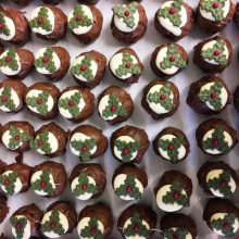 Chocolate Christmas Cupcakes sitting on a bench in a lovely little cake shop in Wolverhampton.